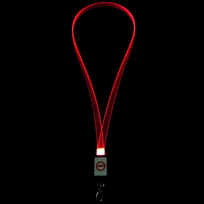 Multicolor fiber optic LED lanyards glowing on a black background