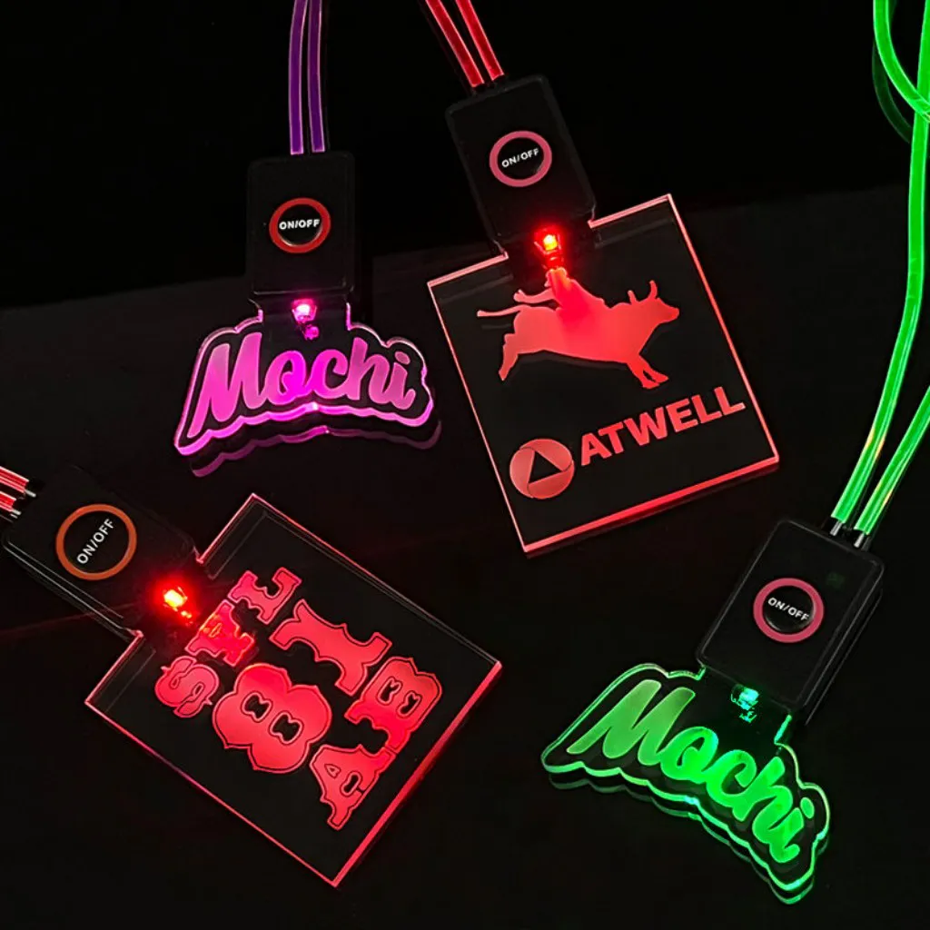Clear acrylic light-up badge with illuminated lanyard and black control module